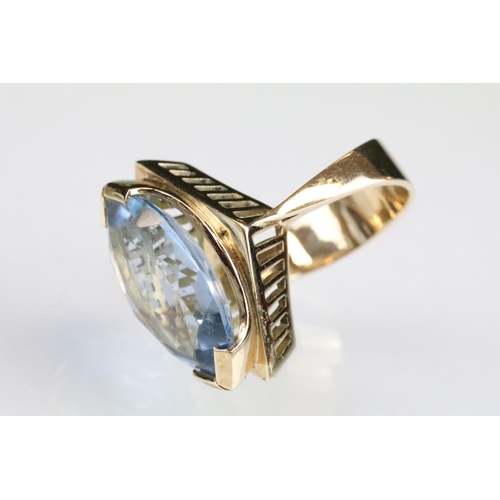 94 - Blue topaz 9ct gold ring, the marquise cut blue topaz measuring approx 18.5 x 12mm, tapered shoulder... 