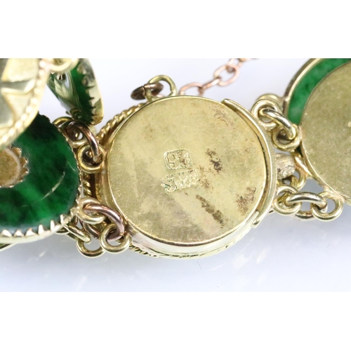 96 - Chinese jade yellow metal panel bracelet, alternate jade disc and yellow metal character mark panels... 