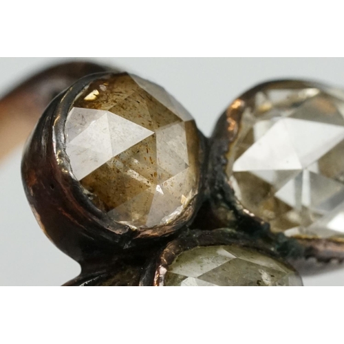 1 - 19th century diamond unmarked gold and silver set ring, three oval rose cut diamonds, the principal ... 