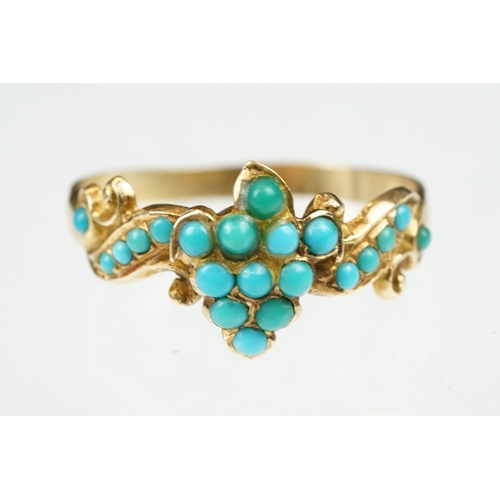 10 - 19th century turquoise unmarked yellow gold ring, the central cluster comprising eleven small round ... 