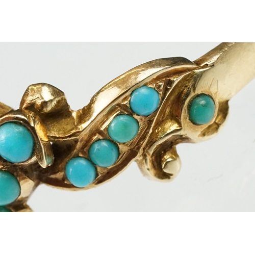 10 - 19th century turquoise unmarked yellow gold ring, the central cluster comprising eleven small round ... 