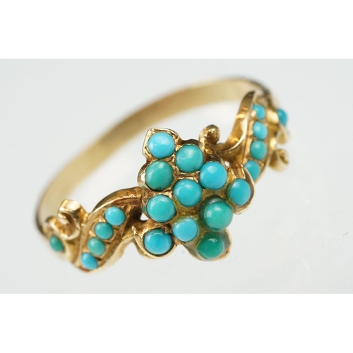 10 - 19th century turquoise unmarked yellow gold ring, the central cluster comprising eleven small round ... 