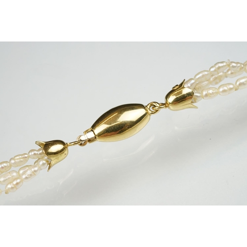 101 - Freshwater pearl three strand necklace with 18ct yellow gold hook and box clasp, length approx 46cm,... 