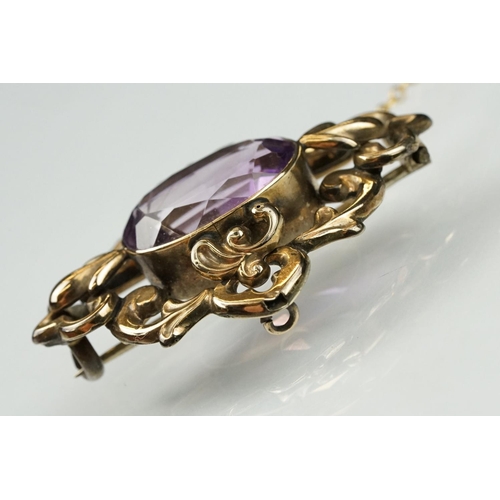 105 - Late 19th /  early 20th century amethyst yellow metal brooch, the oval mixed cut amethyst measuring ... 