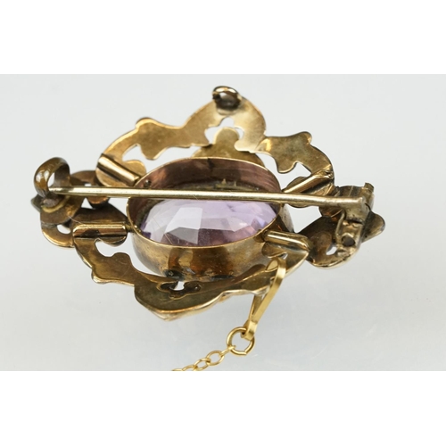 105 - Late 19th /  early 20th century amethyst yellow metal brooch, the oval mixed cut amethyst measuring ... 