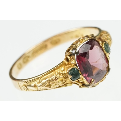 18 - Victorian garnet and emerald 15ct yellow gold ring, the oval mixed cut garnet measuring approx 7x 6m... 