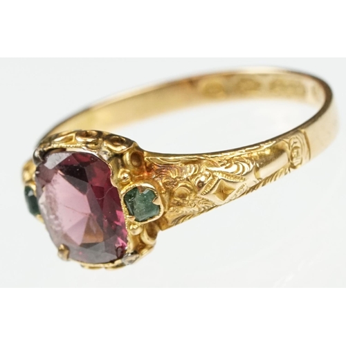 18 - Victorian garnet and emerald 15ct yellow gold ring, the oval mixed cut garnet measuring approx 7x 6m... 