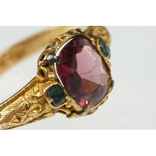 18 - Victorian garnet and emerald 15ct yellow gold ring, the oval mixed cut garnet measuring approx 7x 6m... 