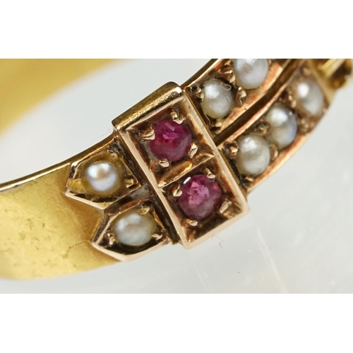 19 - Late 19th century pearl and ruby 15ct yellow gold buckle ring, two rows each set with five seed pear... 