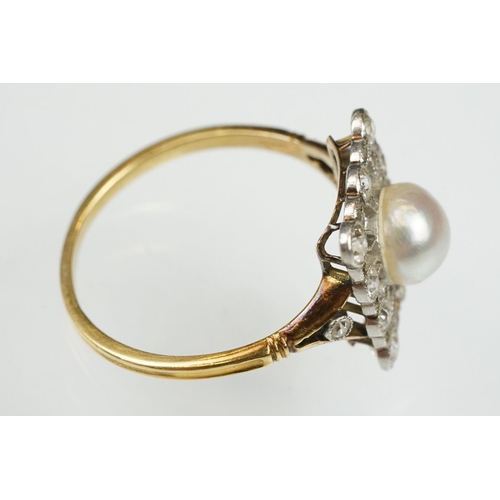 21 - Early 20th century pearl and diamond yellow and white metal set ring, the cream-white pearl with pin... 