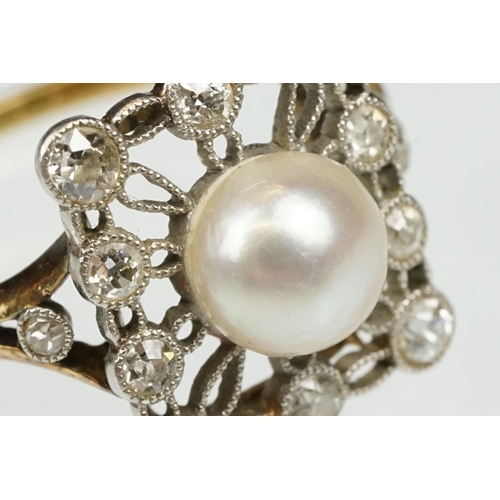 21 - Early 20th century pearl and diamond yellow and white metal set ring, the cream-white pearl with pin... 