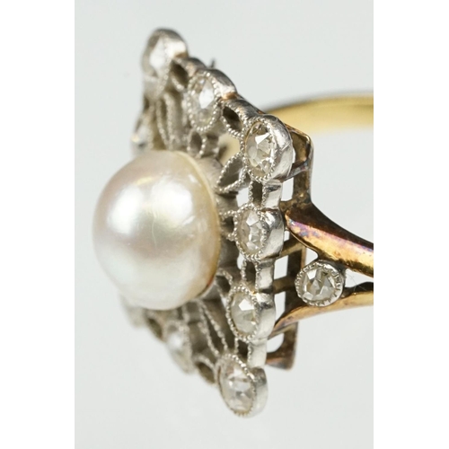 21 - Early 20th century pearl and diamond yellow and white metal set ring, the cream-white pearl with pin... 