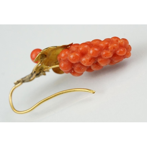 23 - Pair of 19th century carved coral yellow metal earrings, the coral carved as grapes, cast vine leave... 