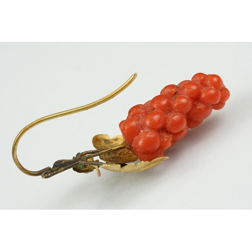 23 - Pair of 19th century carved coral yellow metal earrings, the coral carved as grapes, cast vine leave... 