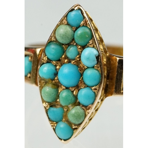 30 - Early 20th century turquoise yellow metal ring, the marquise head full set fifteen small round caboc... 