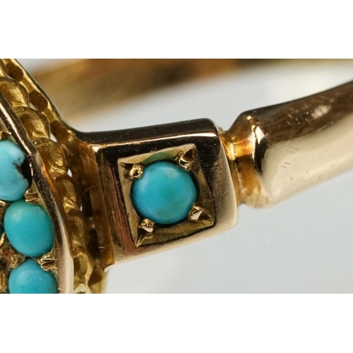 30 - Early 20th century turquoise yellow metal ring, the marquise head full set fifteen small round caboc... 