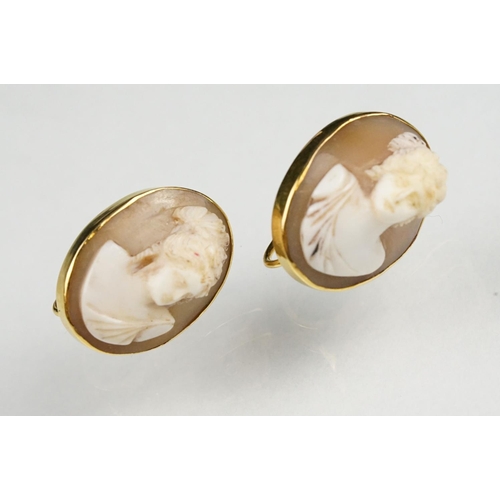 121 - Pair of cameo 9ct gold screw back earrings, the cameo depicting Grecian female bust, rubover close b... 