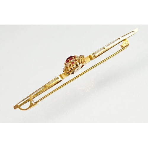 124 - Paste and diamond yellow gold cluster bar brooch, length approx 6cm