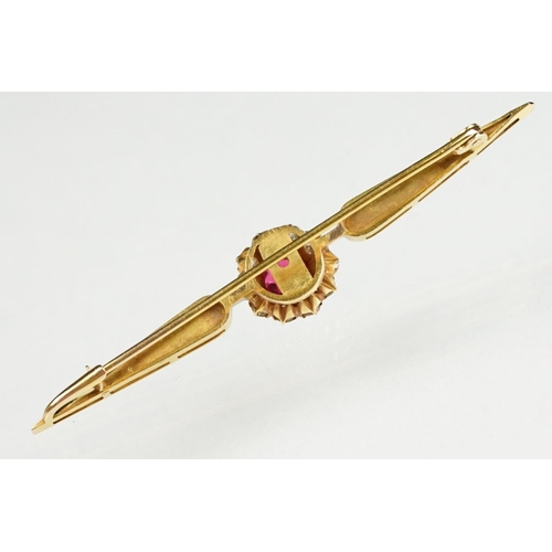 124 - Paste and diamond yellow gold cluster bar brooch, length approx 6cm