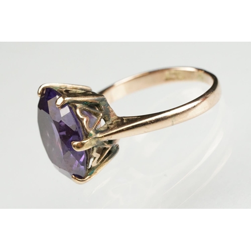 125 - Synthetic colour change sapphire 9ct gold ring, the synthetic sapphire diameter approx 13mm, claw se... 