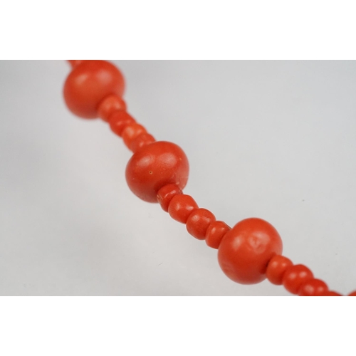 131 - Early 20th century coral necklace with yellow metal bolt ring clasp, length approx 46cm