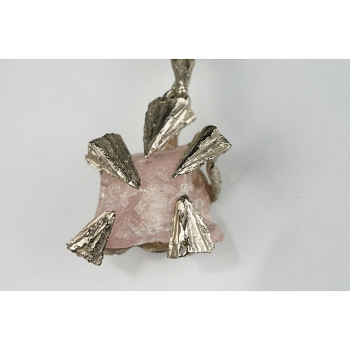 54 - Brutalist rose quartz unmarked silver pendant necklace, the rough rose quart with abstract triangula... 