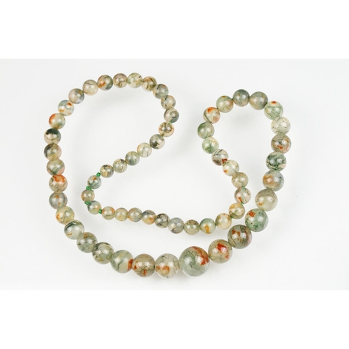 59 - Moss agate bead necklace, sixty-two graduated moss agate beads, the largest measuring approx 17mm, t... 