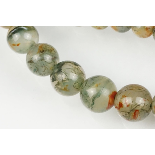 59 - Moss agate bead necklace, sixty-two graduated moss agate beads, the largest measuring approx 17mm, t... 