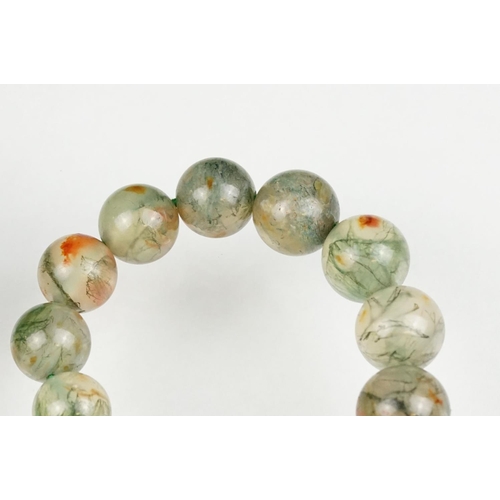 59 - Moss agate bead necklace, sixty-two graduated moss agate beads, the largest measuring approx 17mm, t... 