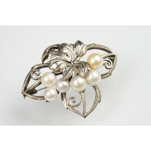 63 - Mikimoto pearl silver spray brooch, six cultured pearls, cream and white, diameter range approx 5.5-... 