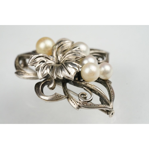 63 - Mikimoto pearl silver spray brooch, six cultured pearls, cream and white, diameter range approx 5.5-... 