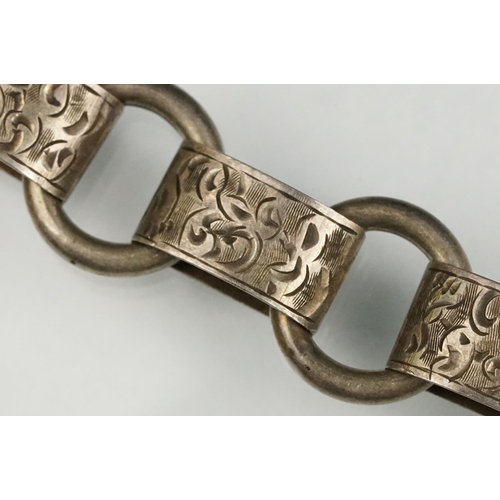 69 - 19th century white metal book chain, missing clasp, engraved foliate scroll links, length approx 45c... 