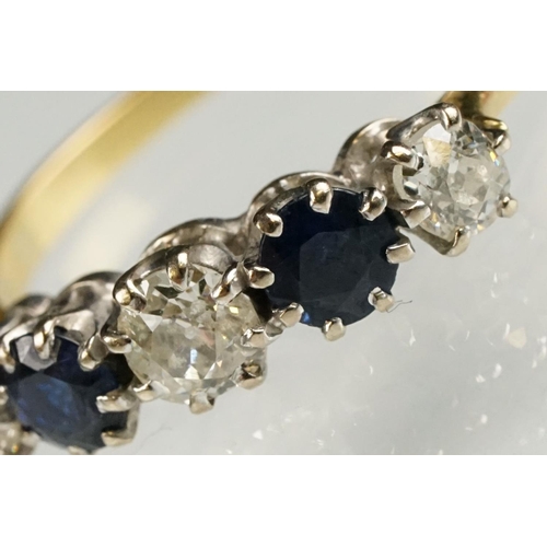 73 - Sapphire and diamond yellow and white metal set five stone ring, three graduated old round cut diamo... 