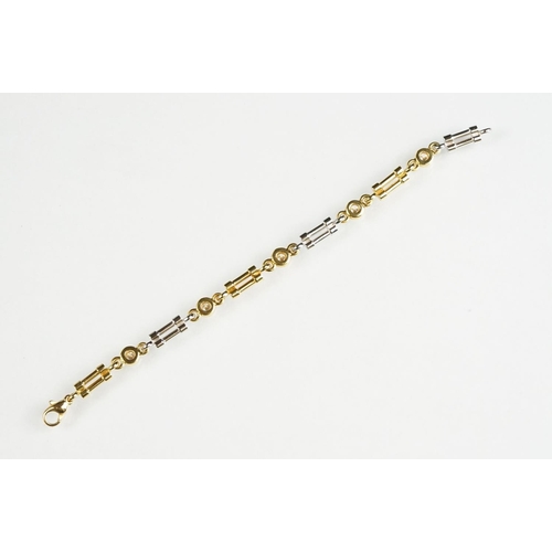 75 - John Watling diamond 18ct yellow and white gold line bracelet, five round brilliant cut diamonds, to... 