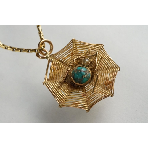 76 - Turquoise and seed pearl 9ct yellow gold pendant necklace, modelled as a spider and spider web, the ... 