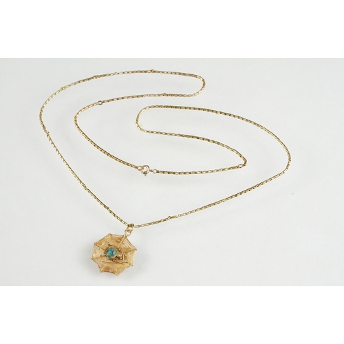 76 - Turquoise and seed pearl 9ct yellow gold pendant necklace, modelled as a spider and spider web, the ... 