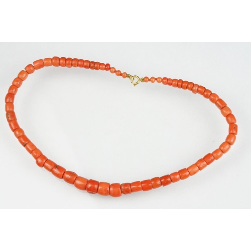 81 - Early 20th century coral graduated bead necklace with 9ct yellow gold clasp, the largest bead measur... 