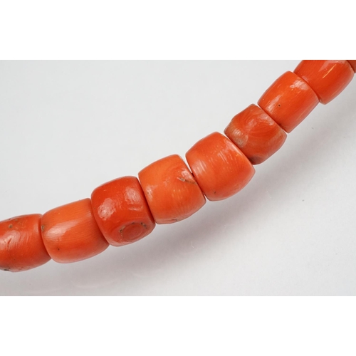 81 - Early 20th century coral graduated bead necklace with 9ct yellow gold clasp, the largest bead measur... 