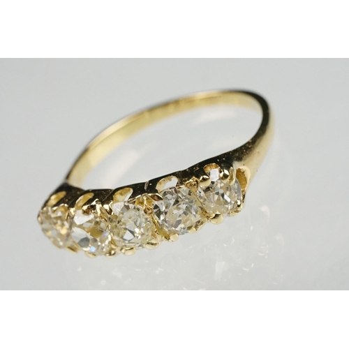 84 - Diamond unmarked yellow gold five stone ring, five graduated old cut diamonds, assessed clarities VS... 