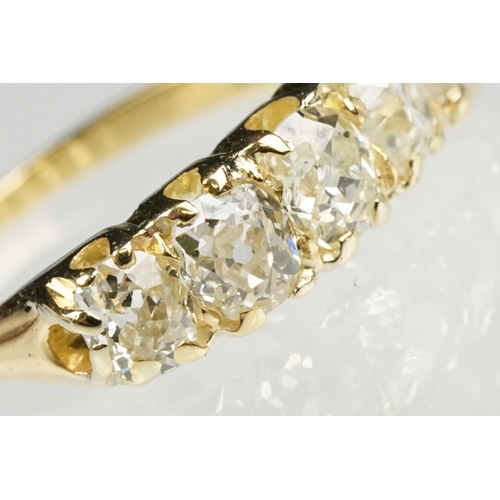 84 - Diamond unmarked yellow gold five stone ring, five graduated old cut diamonds, assessed clarities VS... 