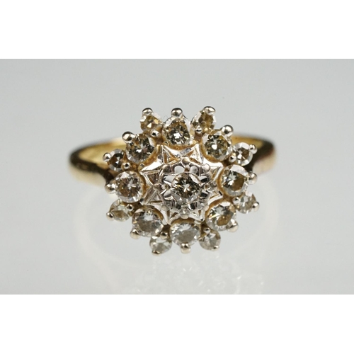 85 - Diamond 18ct yellow gold cluster ring, round brilliant cut diamond to centre weighing approx 0.05 ca... 