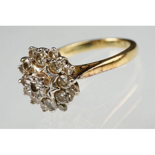 85 - Diamond 18ct yellow gold cluster ring, round brilliant cut diamond to centre weighing approx 0.05 ca... 