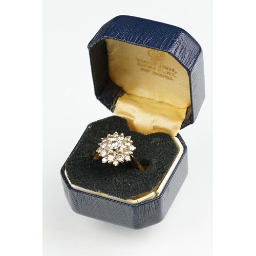 85 - Diamond 18ct yellow gold cluster ring, round brilliant cut diamond to centre weighing approx 0.05 ca... 