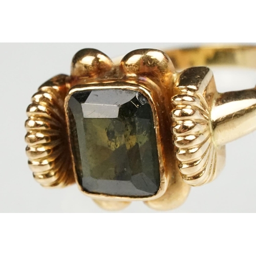 86 - Green tourmaline 18ct yellow gold ring, the rectangular mixed cut tourmaline measuring approx 8 x 6.... 