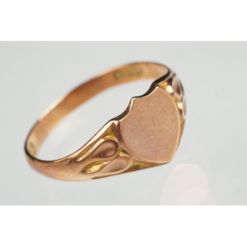 88 - 9ct rose gold signet ring, vacant shield shaped cartouche, tapered shoulders, ring size N, hallmarke... 