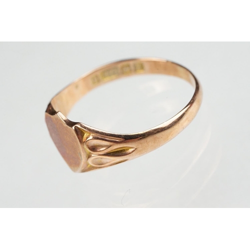 88 - 9ct rose gold signet ring, vacant shield shaped cartouche, tapered shoulders, ring size N, hallmarke... 