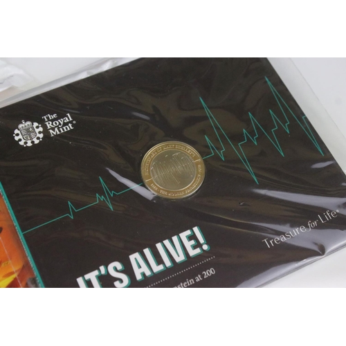 209 - A collection of seven Royal Mint uncirculated £2 coin collectors packs to include A Time to Reflect,... 