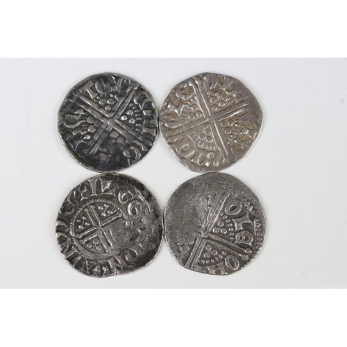 217 - A collection of four British King Henry III hammered silver coins to include three long cross pennie... 