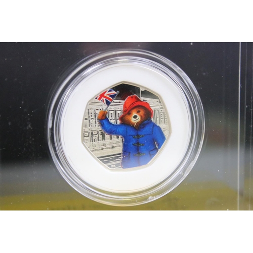 213 - Two United Kingdom Royal Mint silver proof paddington bear 50p coins to include At The Palace & At T... 