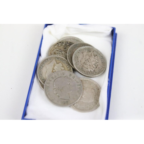 214 - A collection of mainly United Kingdom collectable coins to include 50p and £2 examples together with... 